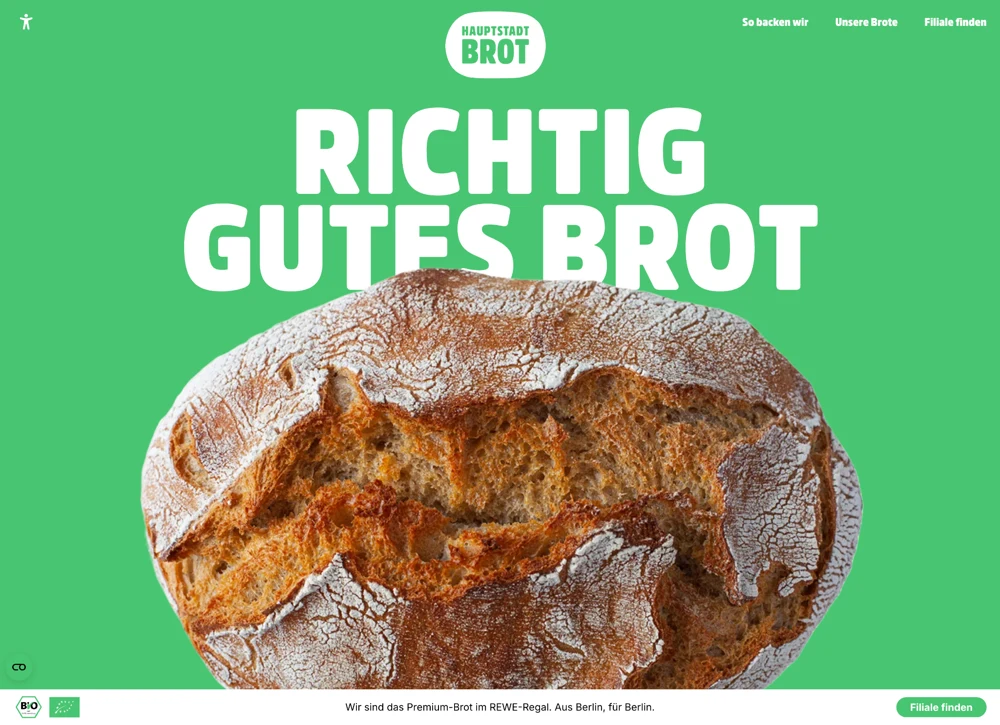 Hauptstadtbrot Website mit grünem Hintergrund und großem Brotbild